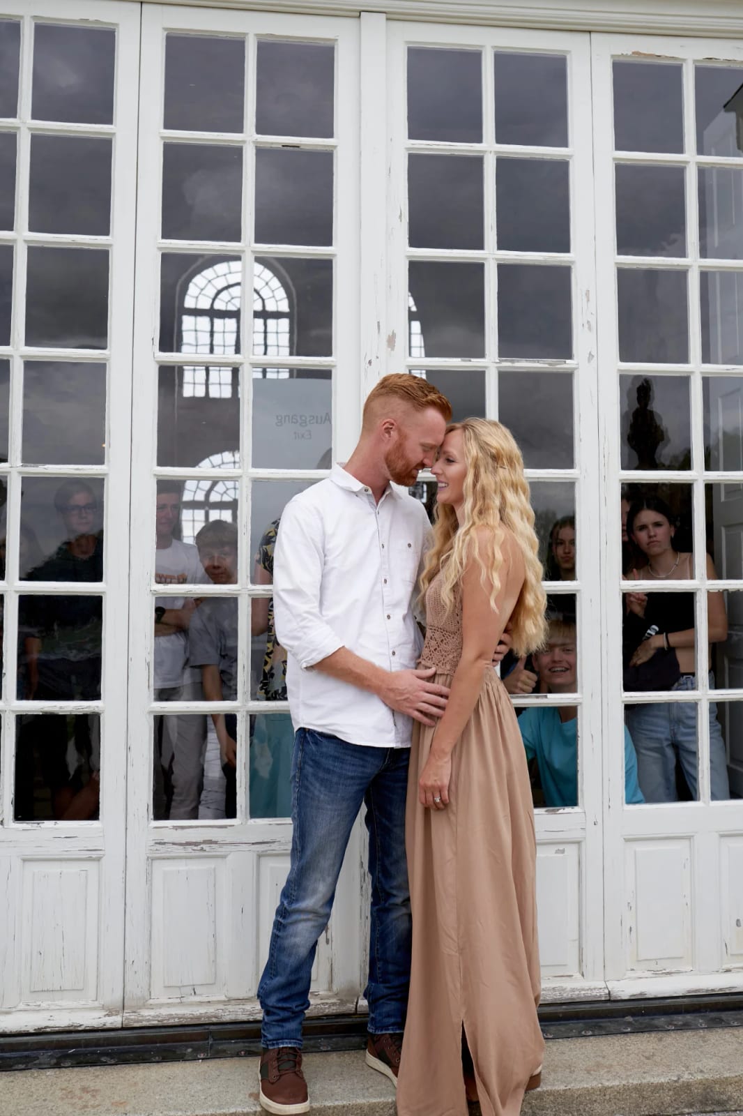 Couple on a walk through the palace park during a couple photoshoot at Nymphenburg Palace Munich
