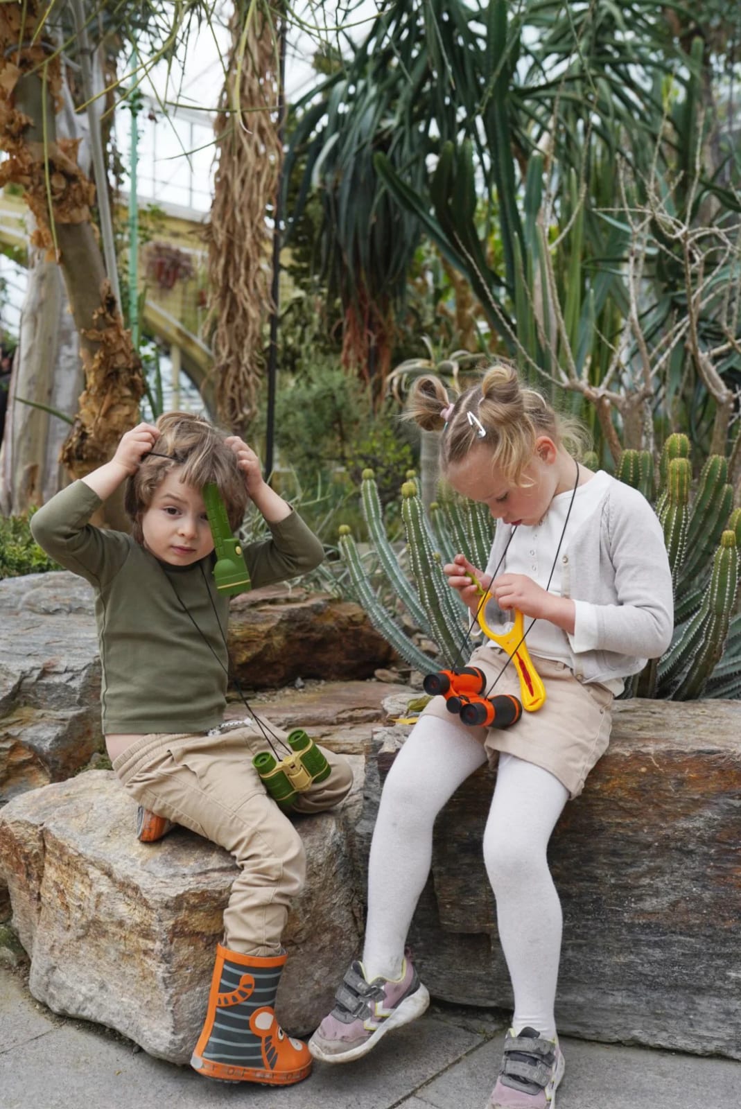 Child in a safari look with earthy tones during an explorer kids photoshoot in Bavaria