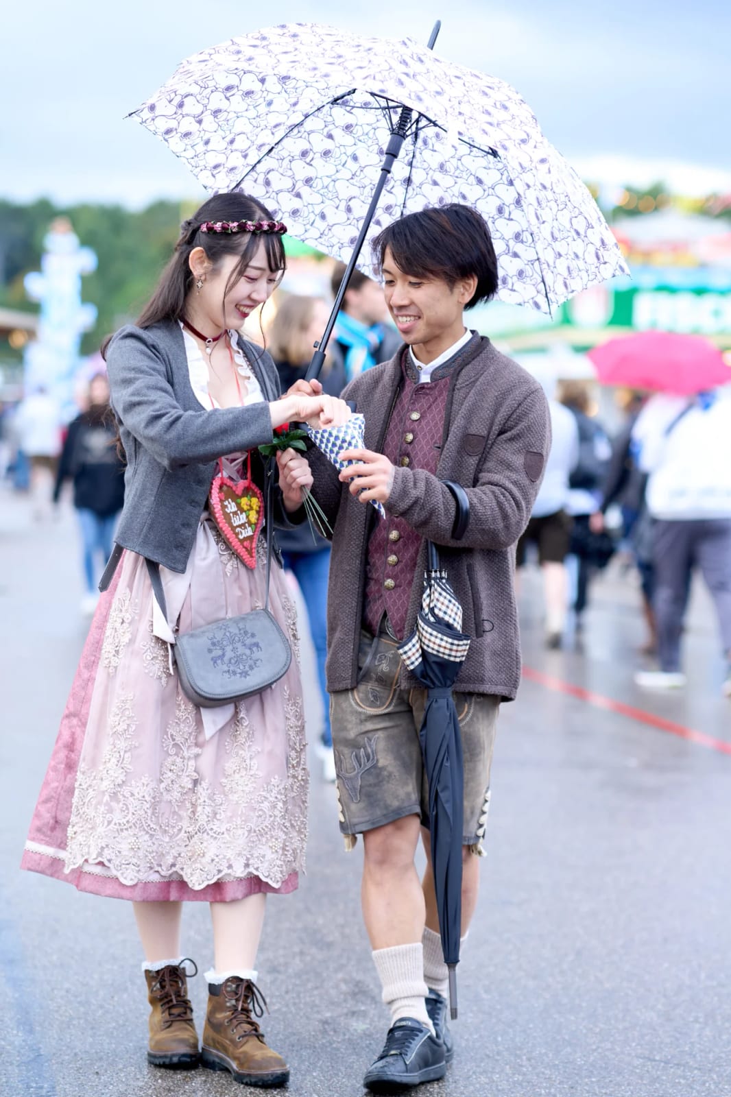 Close-up of a Dirndl and traditional Tracht during an engagement photoshoot at Oktoberfest